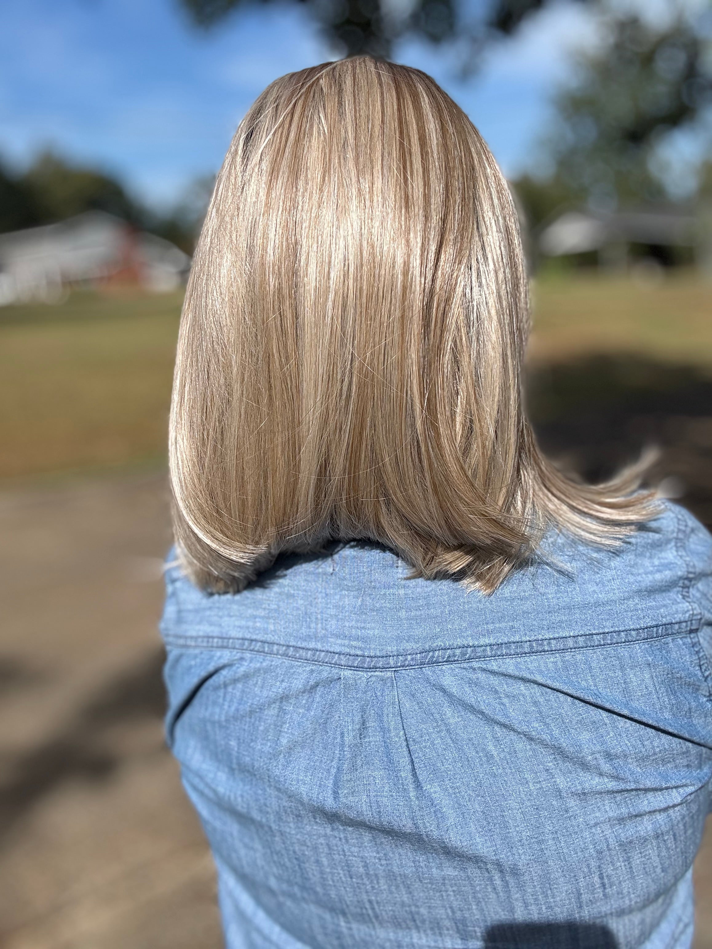 Edie rooted blonde